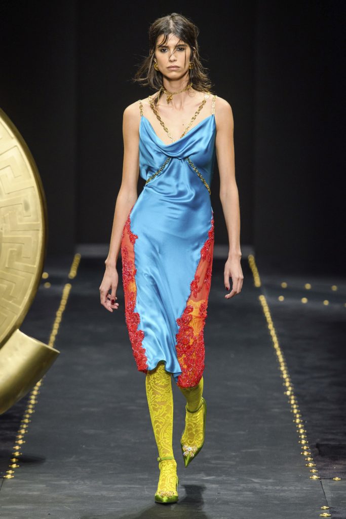 Versace collection fall 2019 runway show-model wearing blue negliget with red lace trim and yellow stockings