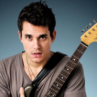 john mayer hugging guitar