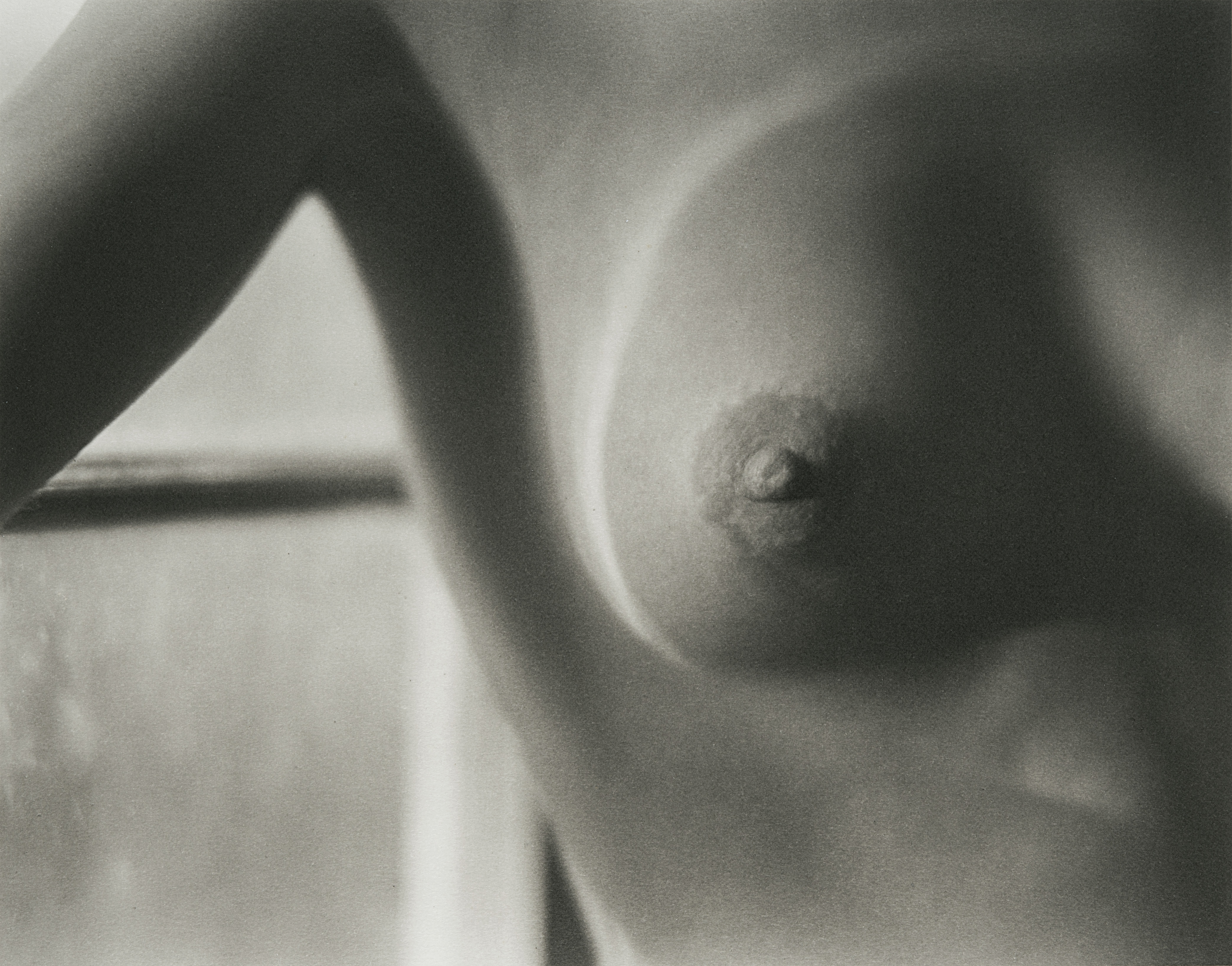 close up of a woman's nipple shot by edward weston