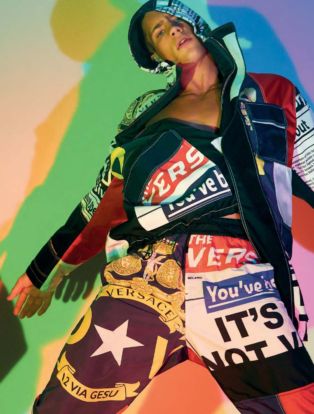 Versace model wearing cool hoodie with printed words