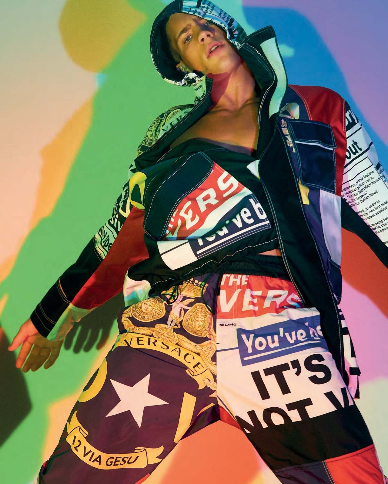 Versace model wearing cool hoodie with printed words