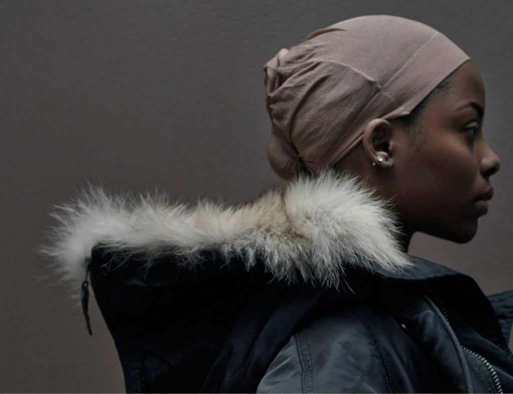 YEEZY-SEASON-ONE-Kanye-West-x-adidas-profile of a model wearing a fur hoodie