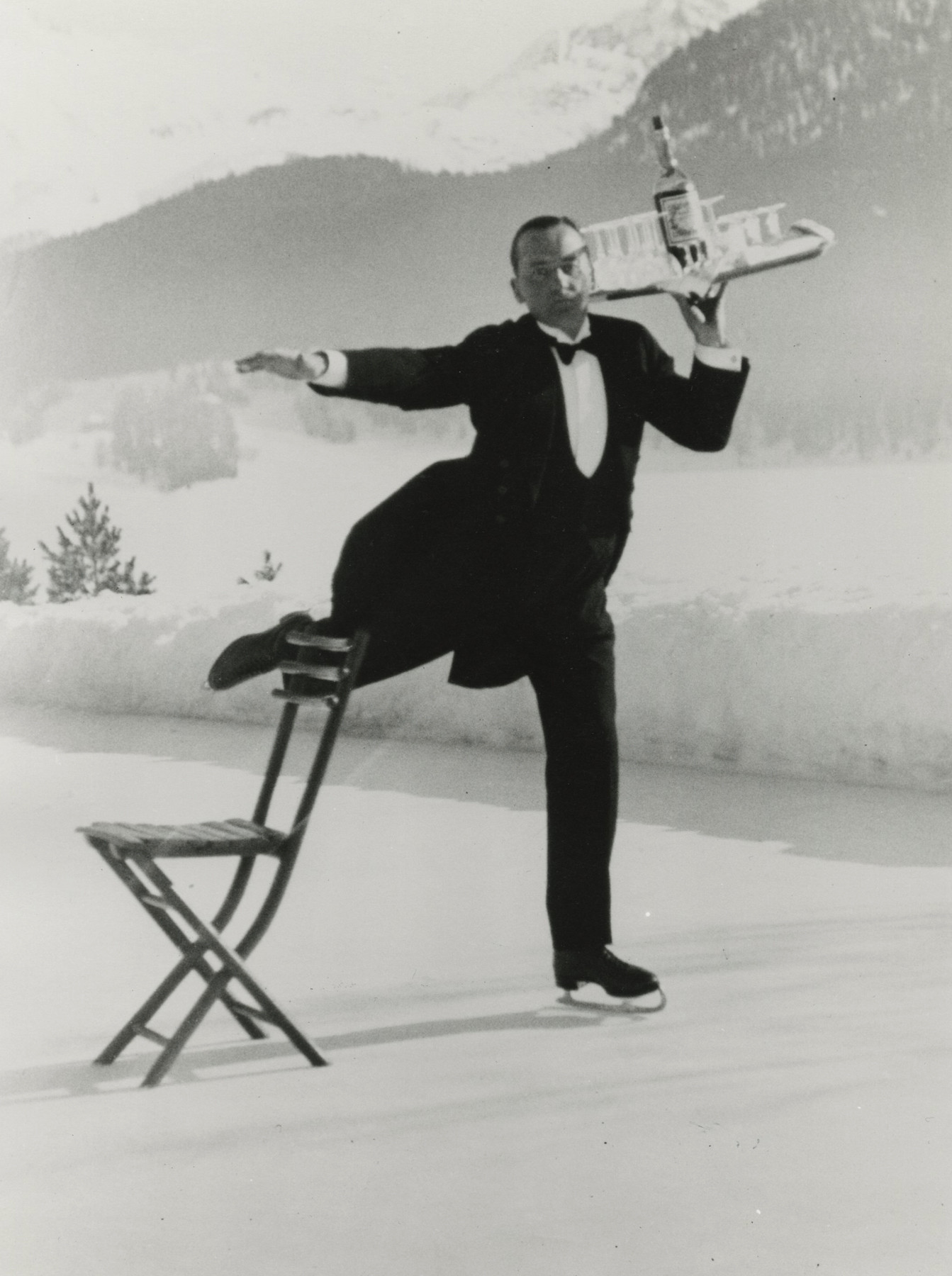 1932 photograph of a waiter on ice skates