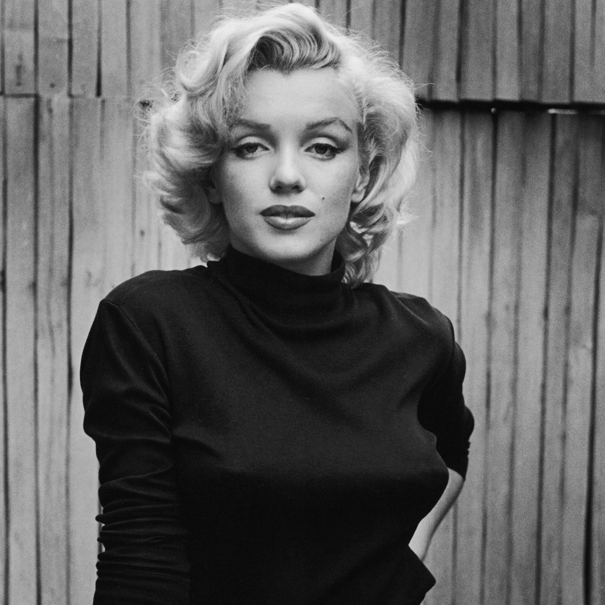 portrait of Marilyn Monroe at home wearing a black turtleneck