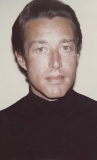 halston- in a black and white photo series of 4 pics