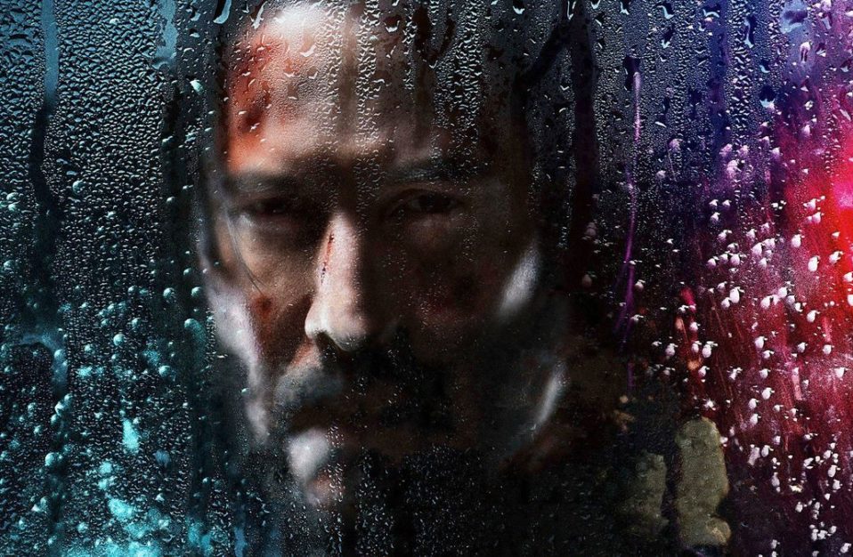 john-wick-3-keanu reeves behind a foggy window with water drips