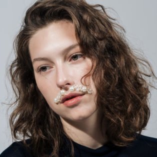 King Princess pearl mustache
