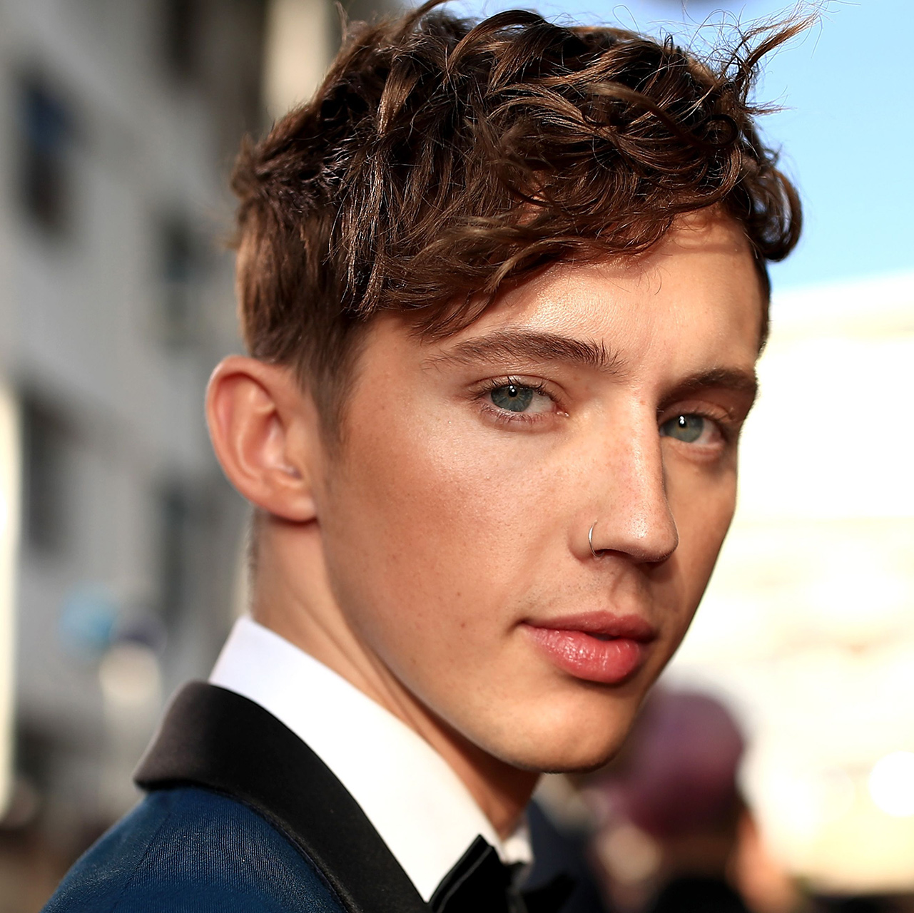 Troye Sivan head shot suit