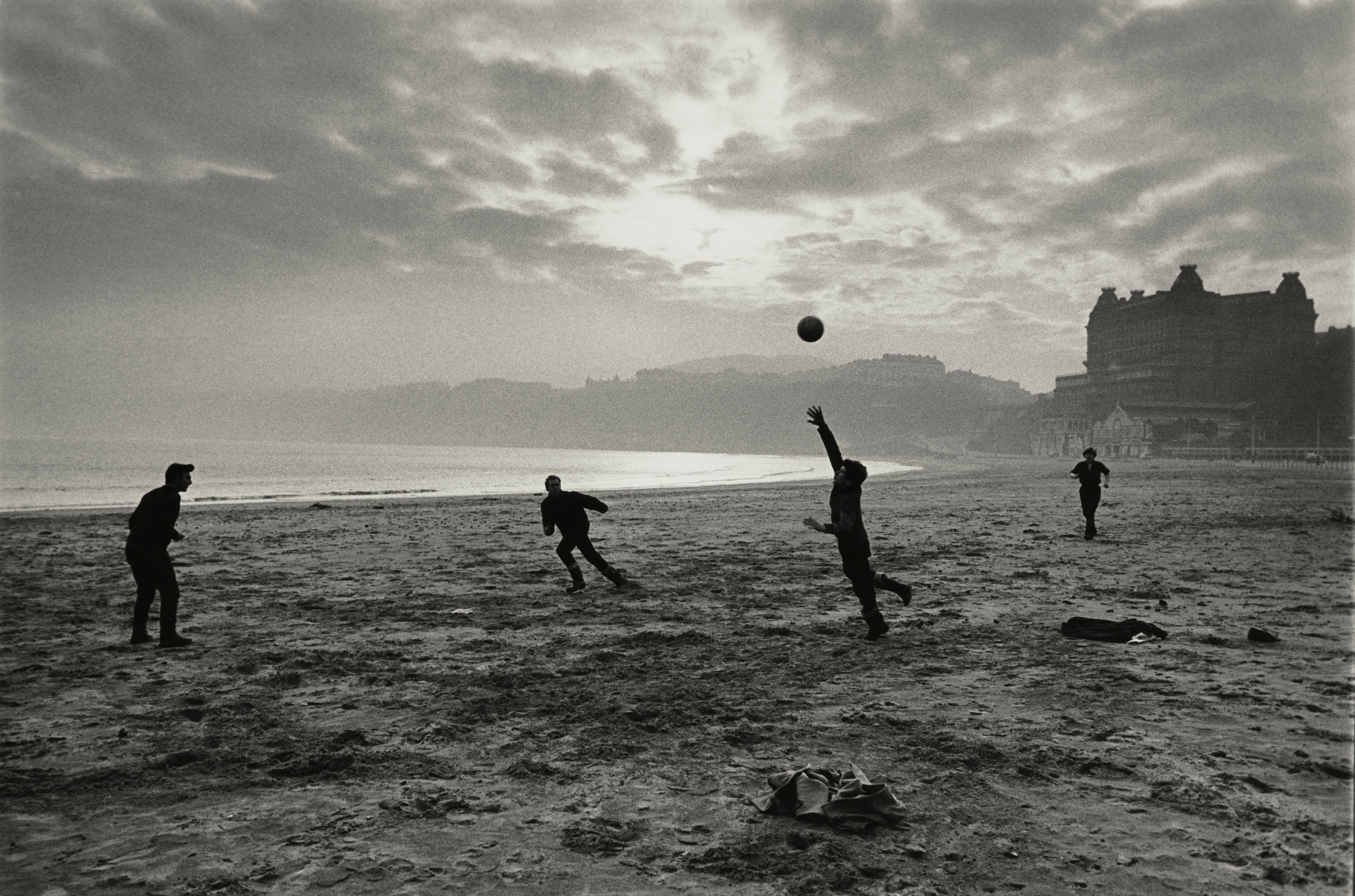 Fisherman Playing during their Lunch Break, Scarborough, Yorkshire, 1967 © Don McCullin
