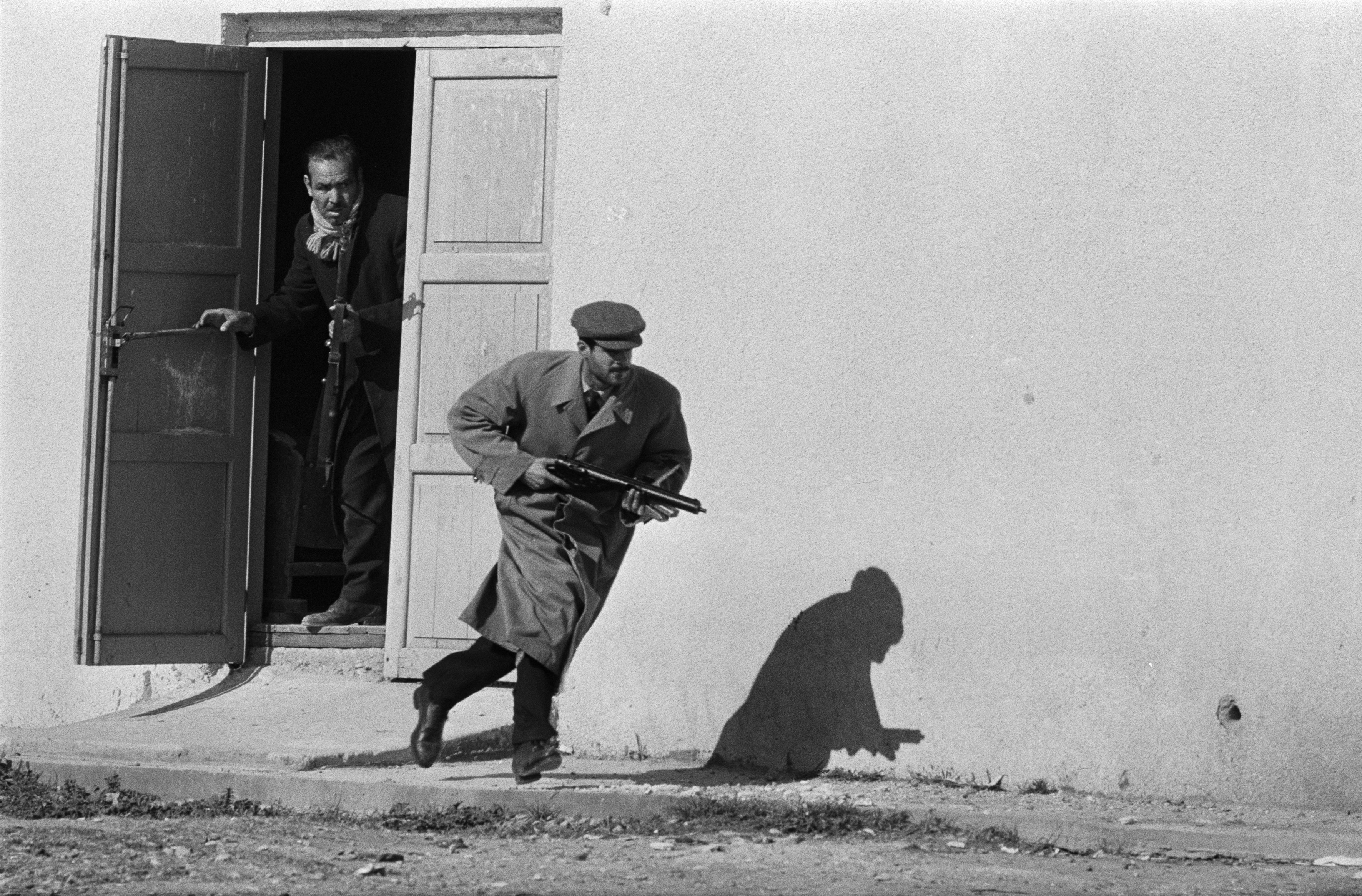 Turkish defender leaving the side entrance of a cinema, Limassol, Cyprus, 1964 © Don McCullin.jpg