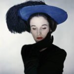 Miss Cushing Mortimer wearing a blue hat with plumes of feathers. (Photo by Erwin Blumenfeld/Condé Nast via Getty Images)