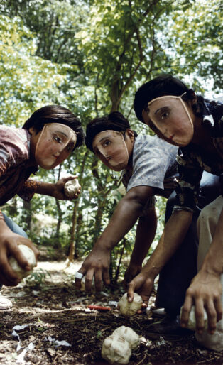 Susan Meiselas, Youths practice throwing contact bombs in forest surrounding Monimbo, 1978; printed later. Inkjet print on mesh. 26 1⁄2 x 39 3⁄4 in. Courtesy the artist. © Susan Meiselas/Magnum Photos