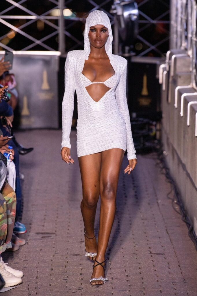 LaQuan Smith Spring Summer 2022 Runway Model Wearing Hooded White Sexy Beaded Mini Dress