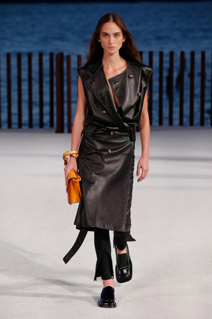 Proenza Schouler Spring Summer 2022 Runway Model Wearing Sleeveless Black Leather Belted Coat