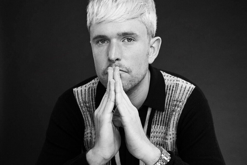 Jame Blake in Contemplation with white dyed hair