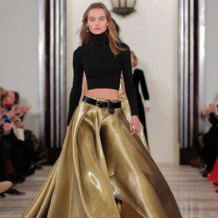 Ralph Lauren Collection Runway Model wearing Gold Flowing Skirt and Black Turteneck Cropped