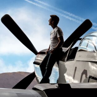 Tom Cruise Leading Against a Fighter Plane in Top Gun Maverick