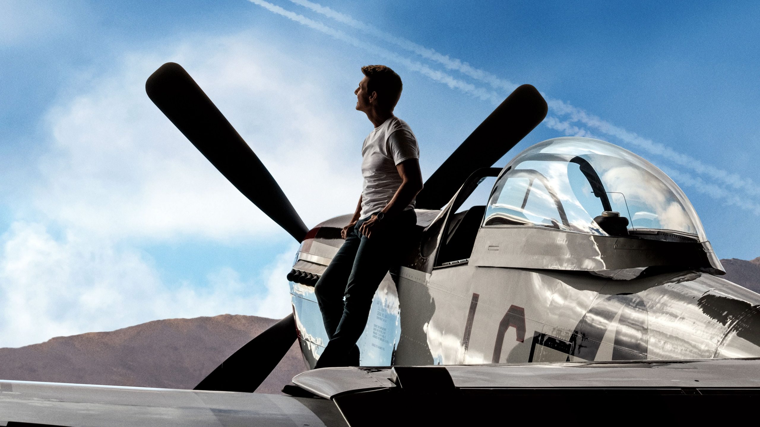 Tom Cruise Leading Against a Fighter Plane in Top Gun Maverick