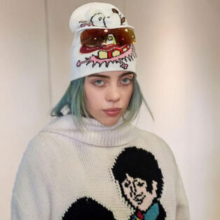 Billie Eilish Wearing Stella McCartney Beatles Capsule Collection Cap and Sweater