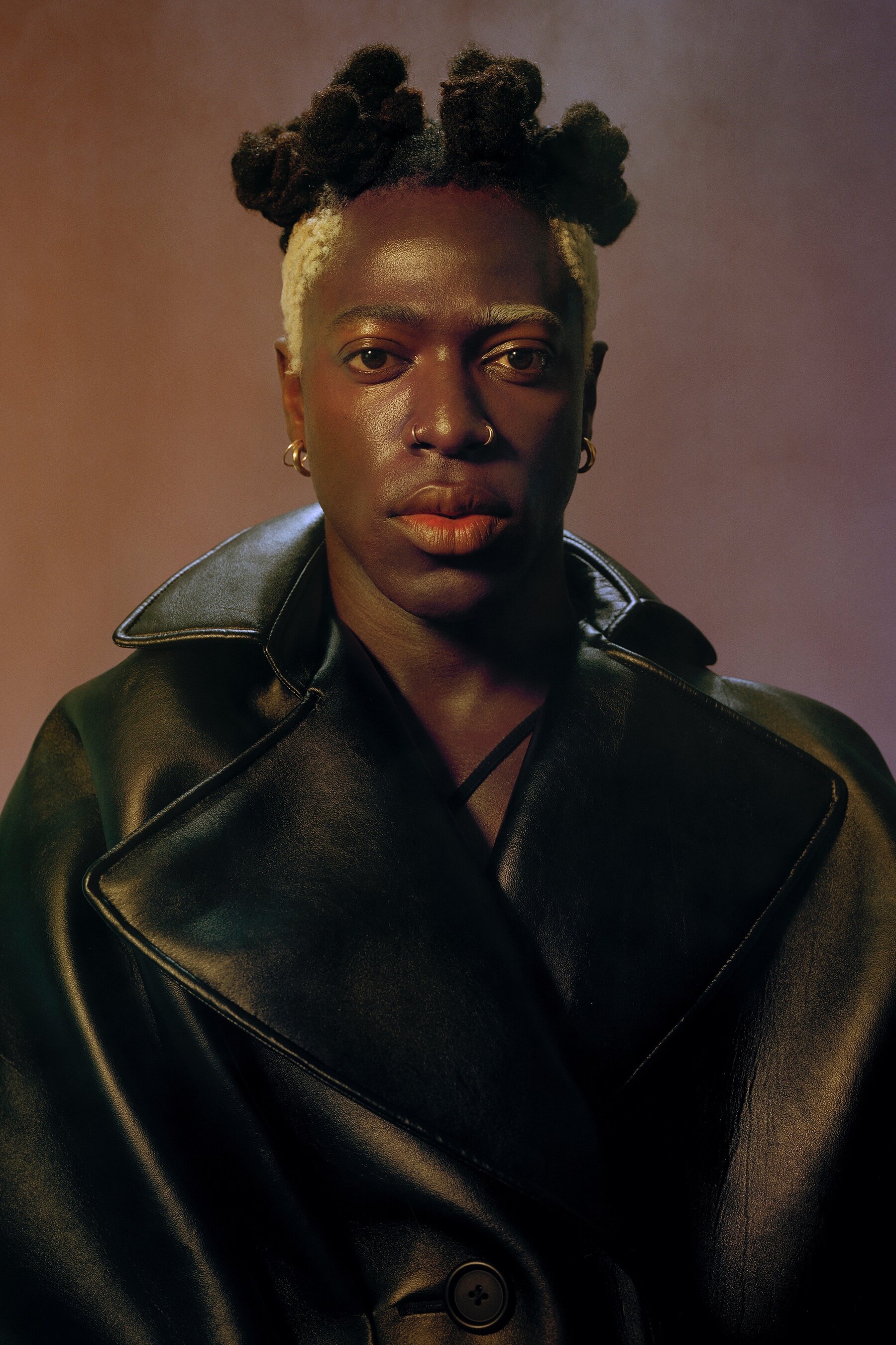 Moses Sumney with small dreds_nose rings and earings