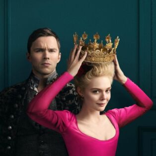 Nicholas Hout and Elle Fanning wearing pink and crown in the Great Season 2