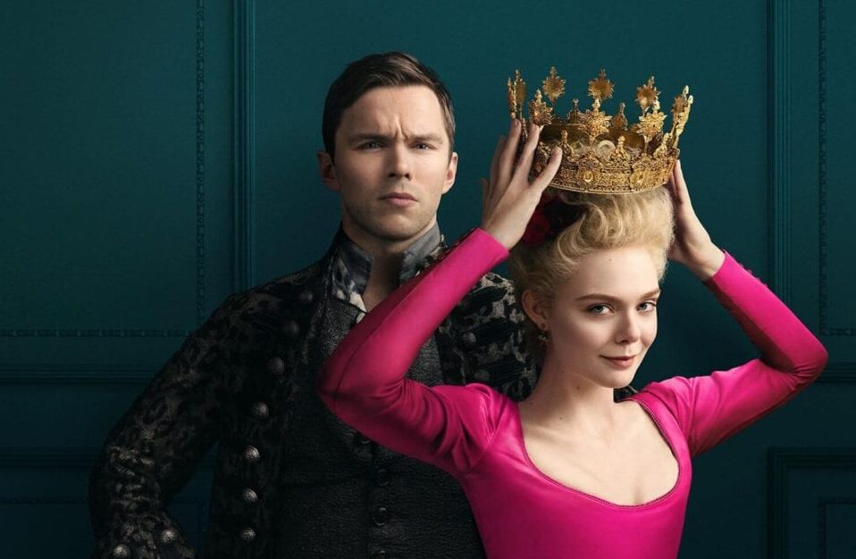 Nicholas Hout and Elle Fanning wearing pink and crown in the Great Season 2