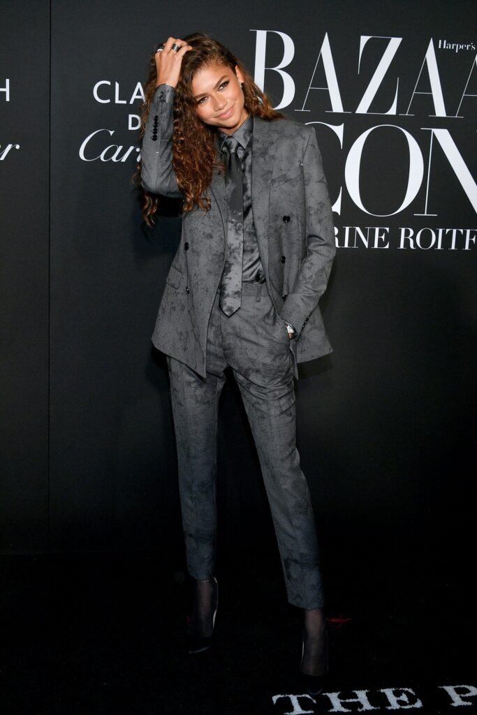 ZENDEYA WEARING A MENS BERLUTI SUIT AND MATCHING TIE