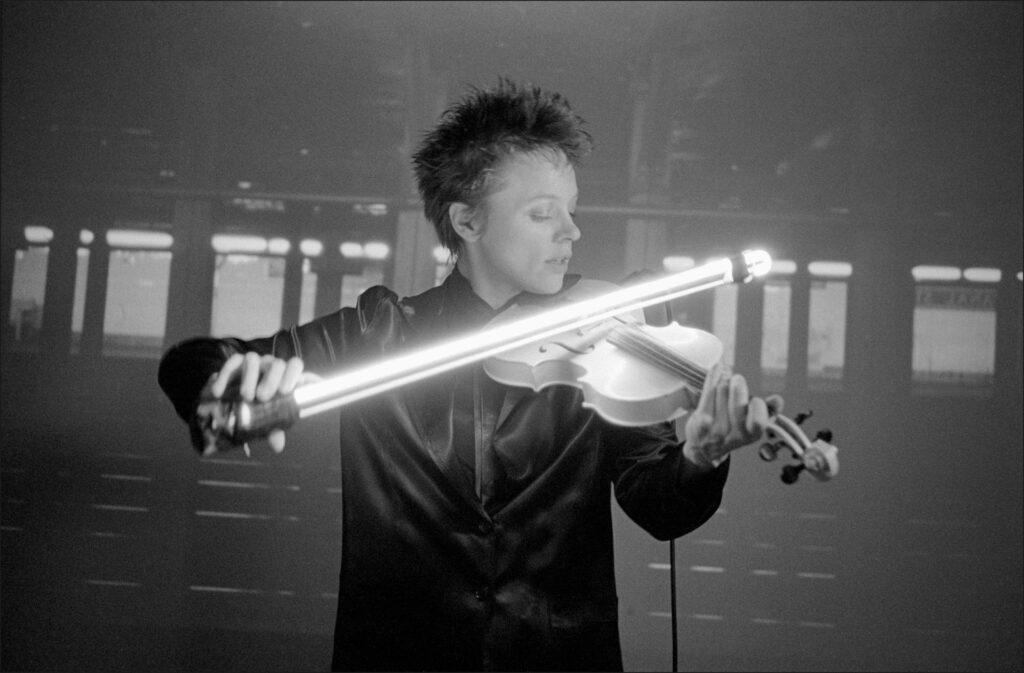 80s Music_Laurie Anderson rehearses for the performance of "USA" shot by Allan Tannenbaum