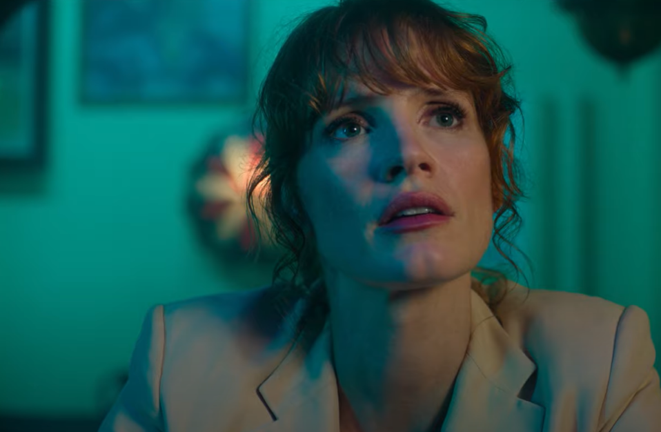 Jessica Chastain Against an Acqua Background in The 355