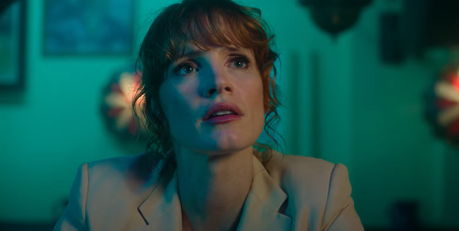 Jessica Chastain Against an Acqua Background in The 355