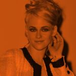 Kristen Stewart image with orange screen wearing Chanel with an Updo