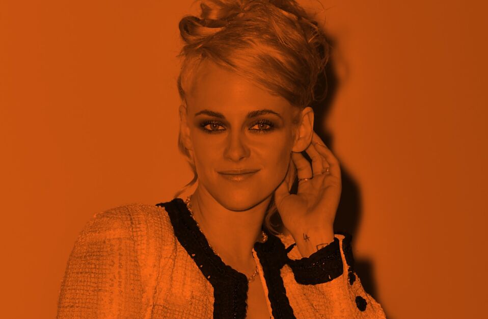Kristen Stewart image with orange screen wearing Chanel with an Updo