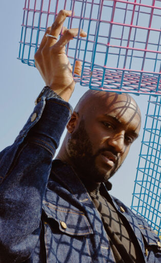 Virgil Abloh Holding Metal Crates