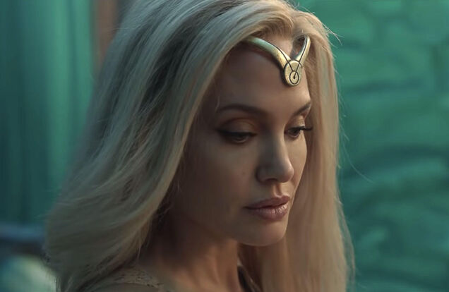 angelina-jolie-as thena in the eternals with blonde hair and gold headband