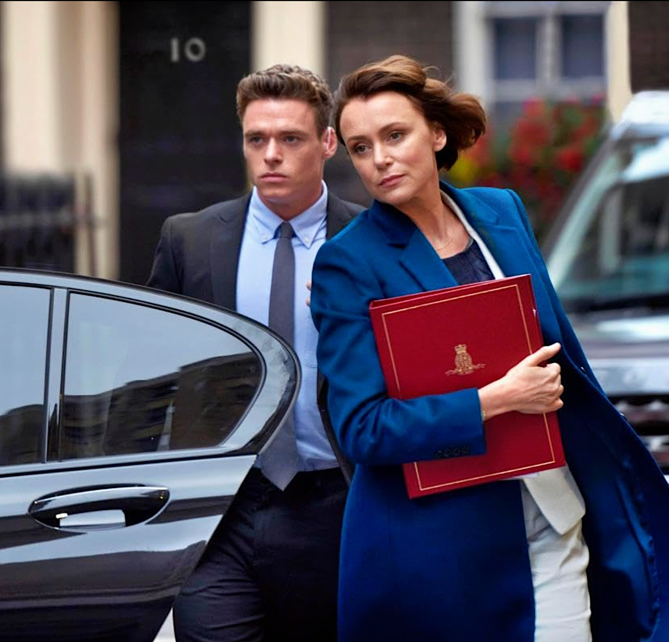 Richard Madden and Keeley Hawes in Bodyguard, walking down street