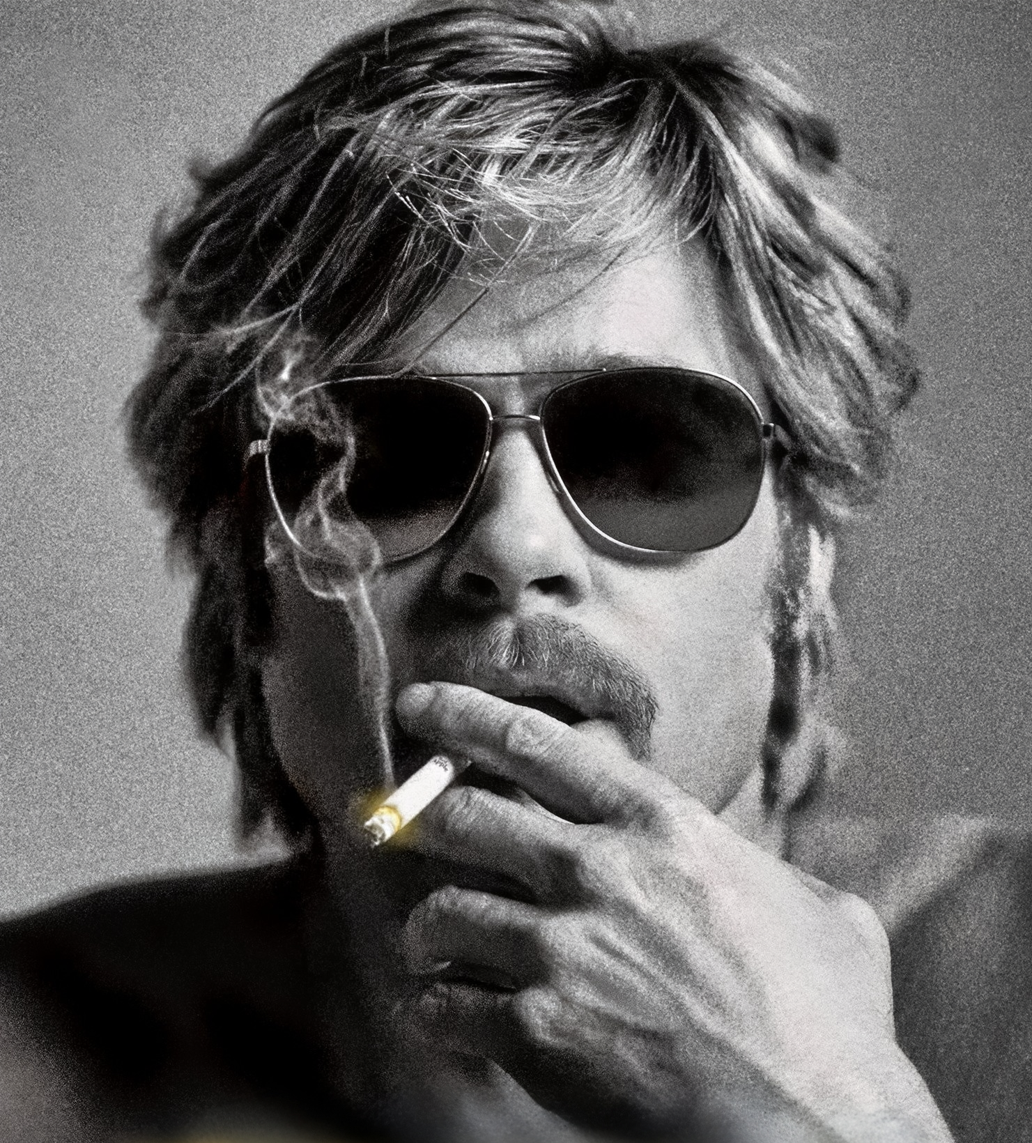Brad Pitt smoking a cigarette, as Cliff Booth