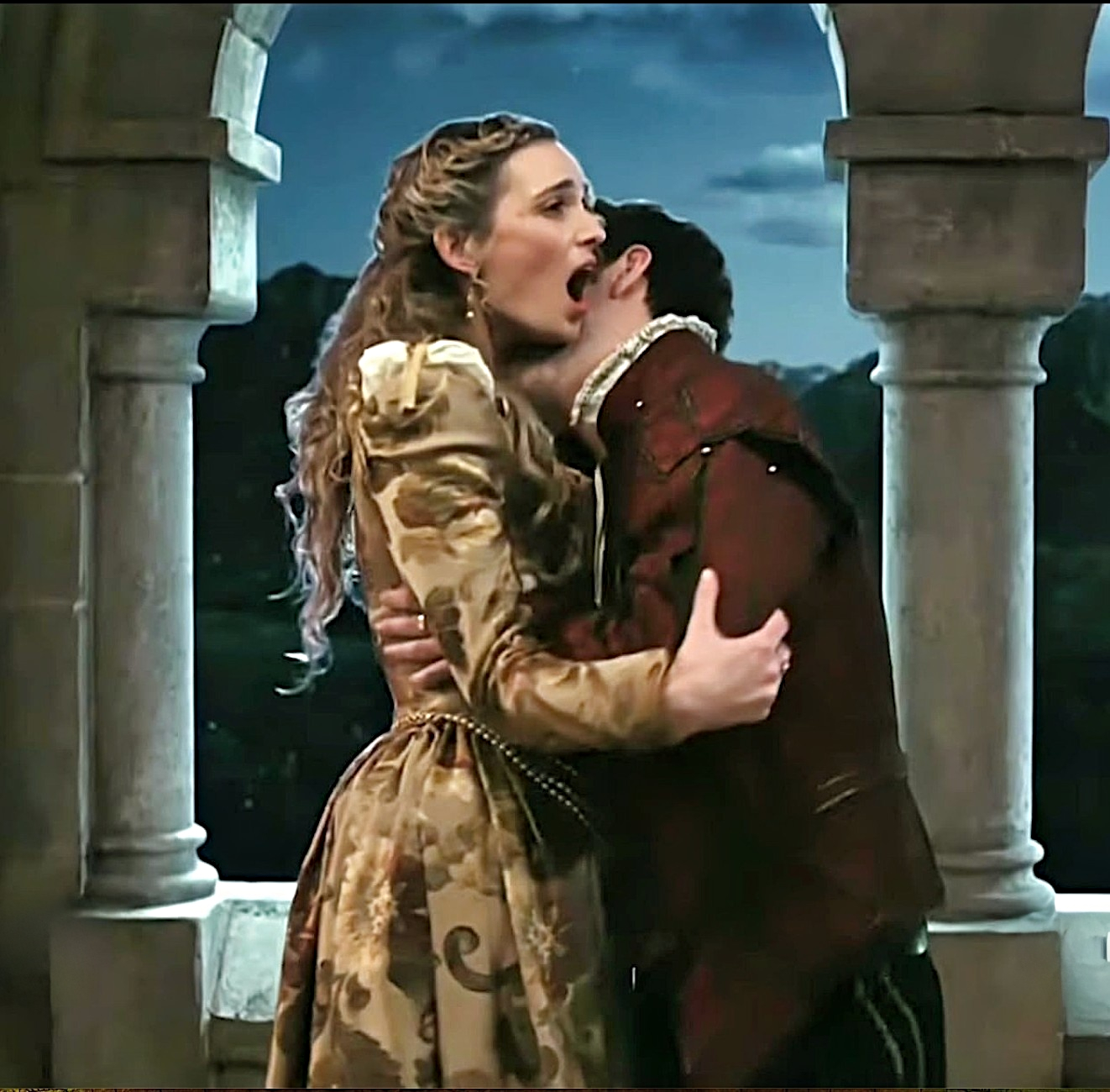 Ed Weeks biting Allegra Edwards on the neck