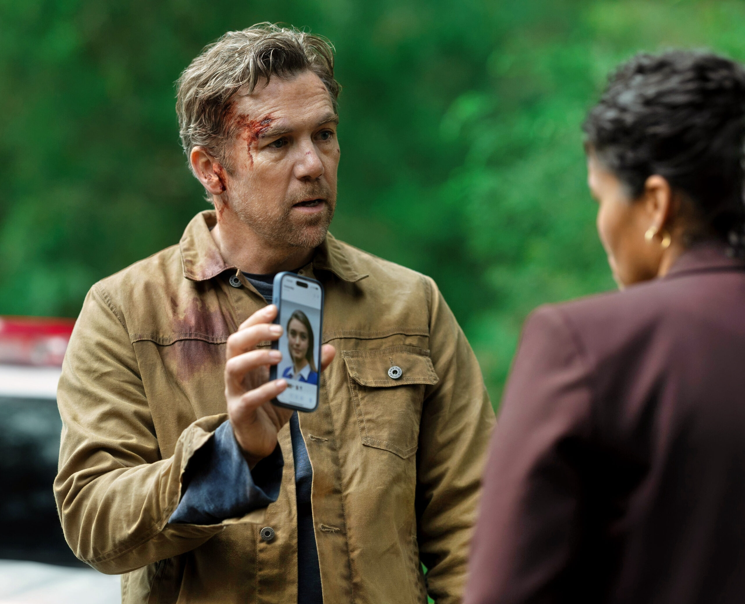 Patrick Brammell holding phone out