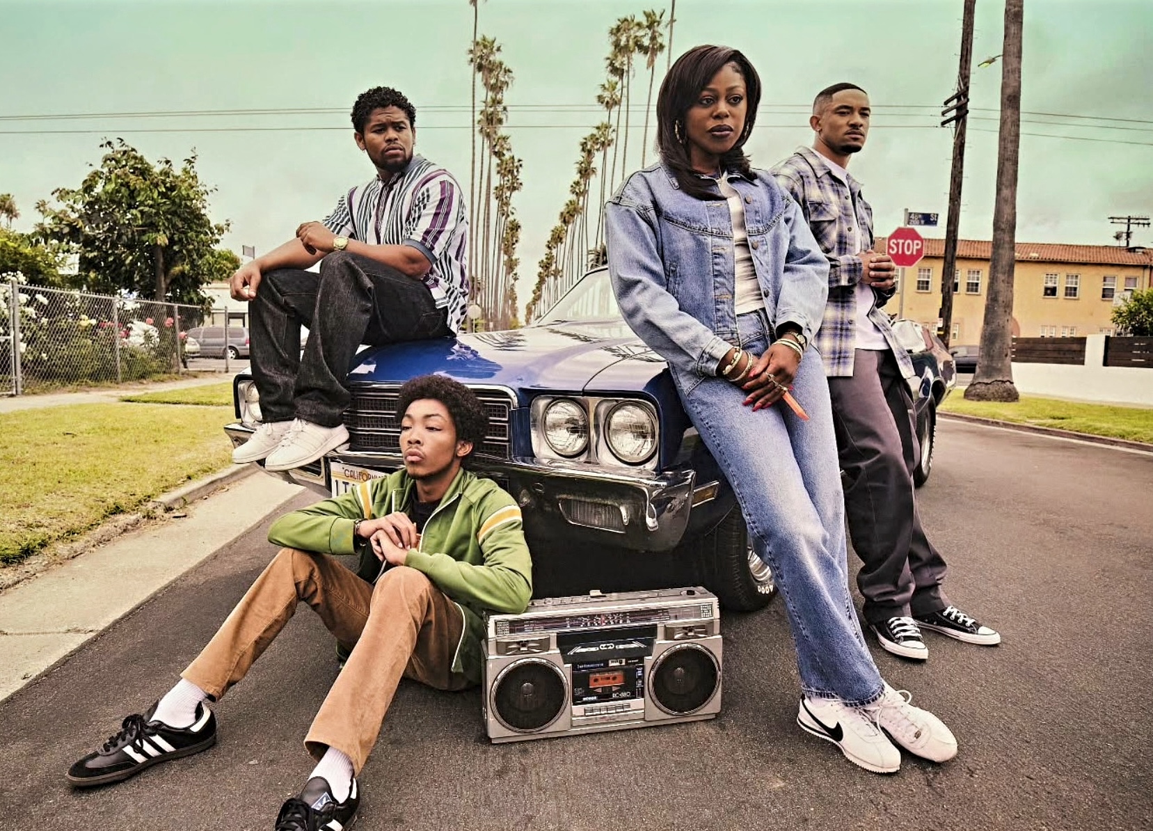 cast of the drop a snowfall saga in front of car