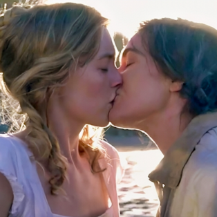 Kate Winslet and Saoirse Ronan kissing in Ammonite
