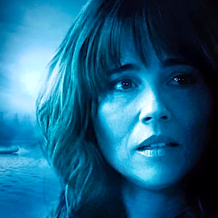 Linda Cardellini in front of lake